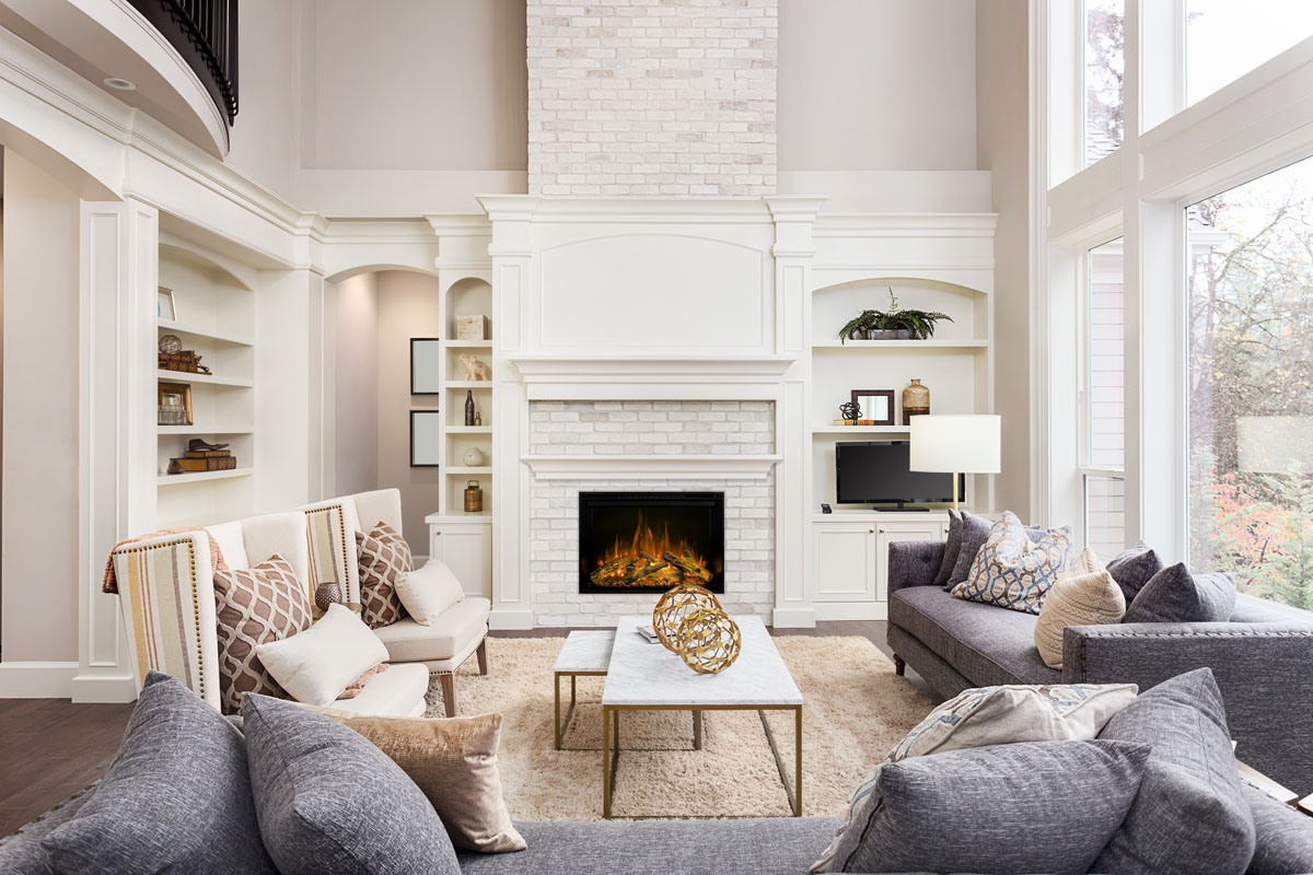 Modern Flames Redstone 36 traditional electric fireplace in a white mantel with built-in shelving